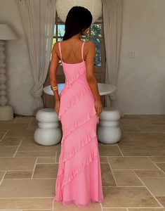 Detail view of pink chiffon maxi dress with layered ruffles and open back design