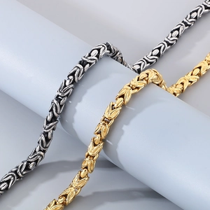 Mens punk Byzantine chain bracelet in 18k gold and silver stainless steel weave