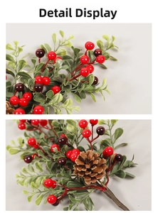 Detail of Christmas berry pick with red berries, pine cones, and green leaves for decor