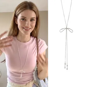 Collana Lunga Con Pendente A Fiocco Lega Colore Argento Catena A Serpente Nappa Goccia D'acqua Elegante Accessorio Moda Donna