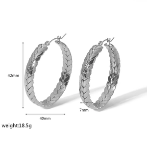 Silver woven hoop earrings detail showing 42mm height and 40mm width measurements