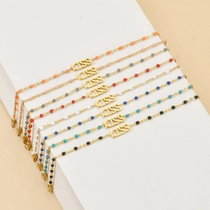 Colorful bead stainless steel KISS bracelets set in gold finish for a stylish trendy look