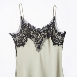 Elegant olive green satin slip dress with delicate black lace trim and side slit detail