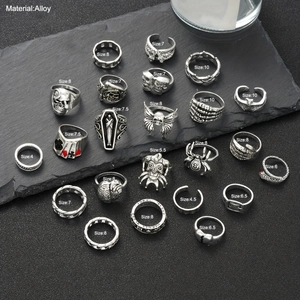 23-piece gothic ring set featuring skull bat and spider motifs in vintage alloy finish