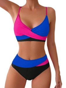 Detail view of the criss-cross V-neck bikini top with vibrant pink and blue color-blocking