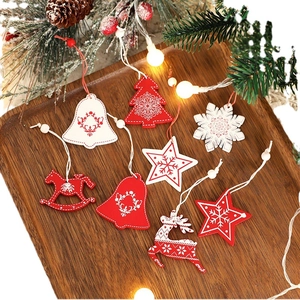 Christmas wooden and wool pendants set with reindeer and snowflake shapes for tree decoration