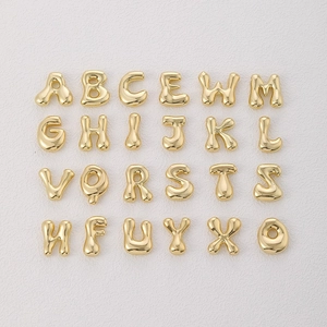 Golden 3D bubble style alphabet pendants set with polished 18k gold plated finish