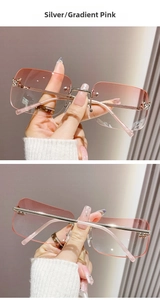 Detail of Y2K rimless sunglasses with gradient pink lenses and silver butterfly crystal accents