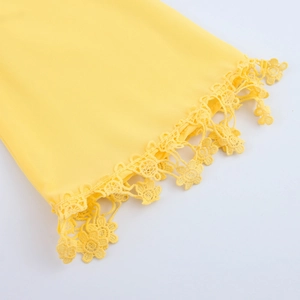 Elegant yellow V-neck dress with intricate lace stitching and hollow fringe details