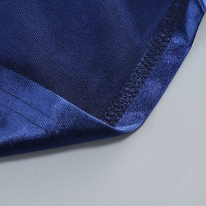 Close-up of starry blue evening dress showing high-quality satin fabric and stitching