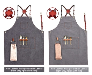 Detail of waterproof canvas aprons featuring leather straps and multi-functional pockets