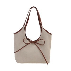 Grand sac cabas en lin avec nœud décoratif et bordures en cuir marron