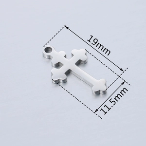 Polished silver stainless steel cross pendant measuring 19mm by 11.5mm in height and width