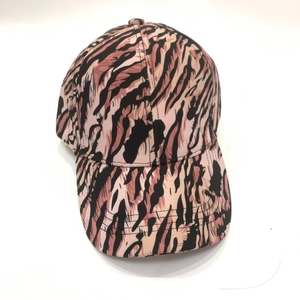 Stylish tiger print baseball cap with pink and beige animal pattern on curved brim hat