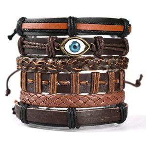 Detail of multi-layer leather bracelet set with blue eye bead and skull metal charms