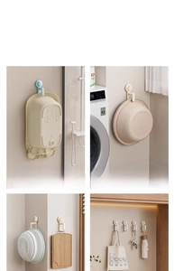 Wall-mounted cream folding hooks showing versatile storage for washbasins and home items