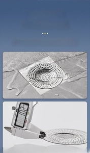 Detailed view of 1.02mm thickened stainless steel floor drain with ruler measurement