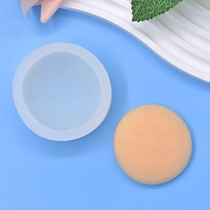 Circular silicone mold for DIY baking and crafts shown with finished round pastry