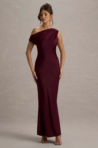 Elegant burgundy off-shoulder satin gown showing refined fabric texture and draping