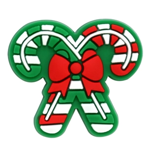 Detail of Christmas candy cane shoe charm with a red bow for clog decoration
