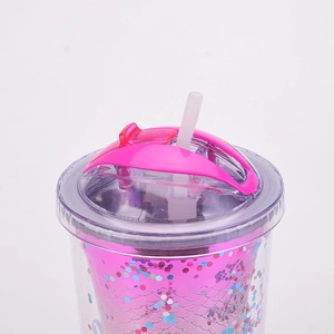 Close-up of pink mermaid scale texture with colorful sequins and a functional lid handle