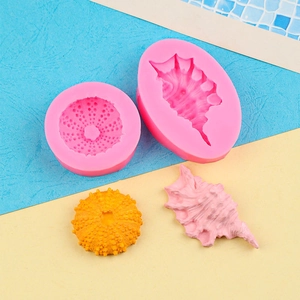 Pink silicone ocean series molds with seashell and sea urchin shapes for fondant baking