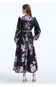 Back view of a long floral print dress with a cinched waist and elegant flowing hemline
