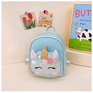 Close-up of light blue unicorn toddler backpack with glitter ears and embroidered details