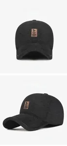 Detail of grey wool-blend baseball cap with leather EDIKO logo and thick warm texture