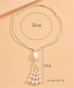 Detail view of pearl tassel necklace with 55cm length and 13cm fringe dimensions