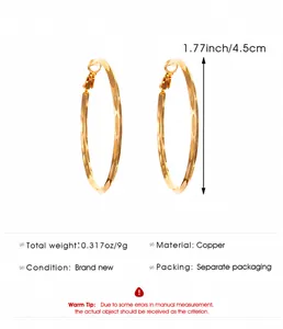 Detail view of large gold hoop earrings with diameter measurements and weight data