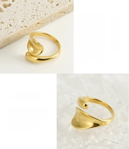 Detail of 18K gold plated stainless steel leaf ring with smooth organic flowing lines