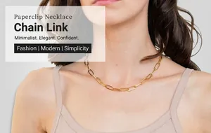 Detail of 18K gold-plated stainless steel paperclip chain necklace worn by a female model
