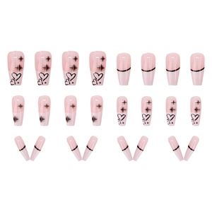 Pink French gradient press-on nails with black hearts and star motifs in a 24-piece set