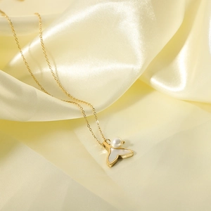 Elegant gold mermaid tail necklace with natural mother of pearl and pearl pendant on silk