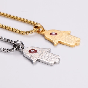 Gold and silver Hamsa Hand necklaces with evil eye pendant on stainless steel chains