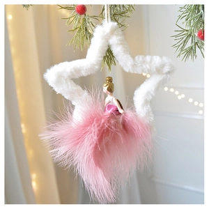 Close-up of plush star frame Christmas ornament with ballet girl and pink feathers