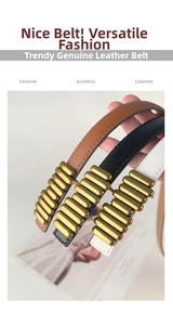 Detailed macro view of a genuine cowhide leather belt with a ribbed gold metal buckle
