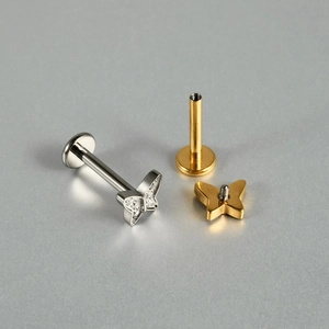 Piercings papillon et patte en titane G23 avec oxydes de zirconium en argent et doré