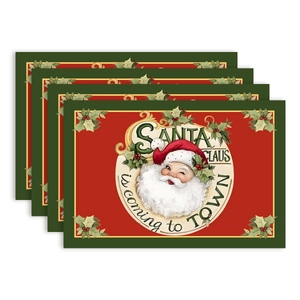 Set of 4 Christmas table mats with Santa Claus pattern in festive red and green colors