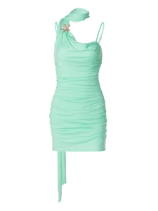 Detail view of mint green bodycon dress with starfish metal buckle on shoulder strap