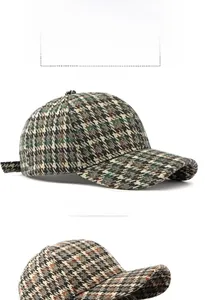 Detail view of the classic houndstooth pattern and hard-top structure on the baseball cap