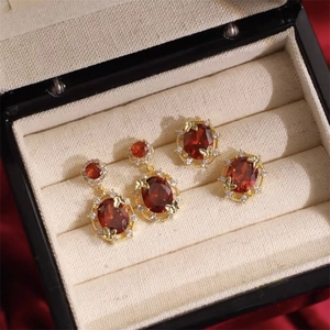 18K gold plated jewelry set with oval ruby gemstones and zircon accents in a gift box