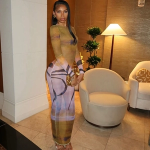 Detail of sheer mesh dress with earth-toned abstract print and elegant floor-length cut