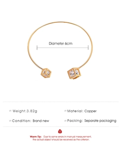 Detailed view of golden open cuff bracelet specifications with square zircon stones