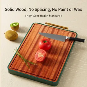 Solid ebony wood cutting board with gold handle and antibacterial stainless steel base