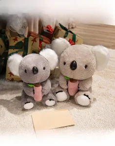 Close-up of gray and brown koala plush toys in 20cm and 25cm sizes on a cozy carpet