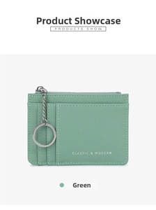 Detail of mint green Saffiano leather card holder with card slots and key ring chain