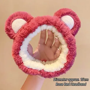 Close-up of rose red plush headband with bear ears showing 15cm diameter size detail