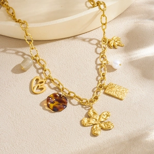Collier vintage en acier inoxydable doré avec breloques cœur, fleur et imprimé léopard